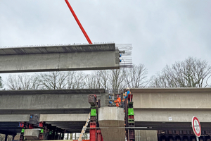  Bridge girders were installed using an 800-ton crawler crane. It took 50 truckloads to set up the crane 