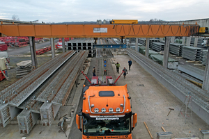  Transporting the massive bridge girders: The loaded truck and trailer combinations weighed between 120 and 135 tons  