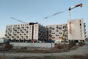  Manufacture and delivery of construction elements for a new Flexliving residential estate made of wood-concrete construction in Valdebebas (Madrid), now under construction by Molins Precast Solutions and CREE Buildings from the construction company ACR 