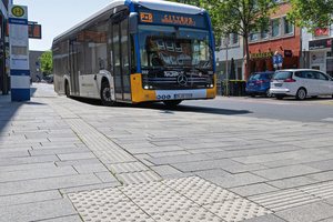  Integrated slabs with grooves and studs, in particular, make the pedestrian zones close to the bus lanes safe for blind and visually impaired people  