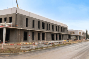 Fig. 7: Installation of wood concrete walls, double wall panels with low embedded carbon, and Isopre walls for the new hospital  