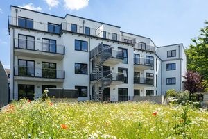  Fig. 5: A communal garden adjoins the rear side of the building. It can be accessed via the terraces integrated at ground-floor level.  