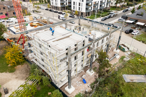  Fig. 1: The Dreihaus during the construction phase on the Campbell Heidelberg conversion site: Germany’s first serially produced 3D-printed apartment building was completed in less than twelve months 