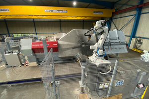  Fig. 3: The new PBX stirrup bender from EVG with integrated ABB robot and conveyor line. The bending shop was restructured and a raised platform added to meet installation needs  
