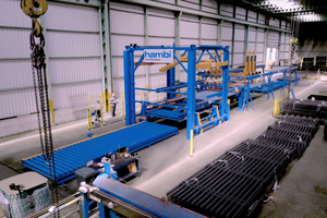  Fig. 7: The system for cutting and handling the steel mesh takes up much space; it is six meters high and over 40 meters long  