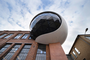  Fig. 1: The Oscar Niemeyer Sphere on the grounds of the Leipzig Kirow Works was designed by star architect Oscar Niemeyer and built by Dechant Hoch- und Ingenieurbau  