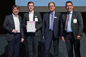  Prof. Dr.-Ing. Michael Haist (Chair of the Expert Jury) congratulates Janos Gründling of Emidat on winning the Innovation Prize of the Supplier Industry for Concrete Components 2026; next to him are the award sponsors Dr. Ulrich Lotz (Managing Director of FBF and organizer of BetonTage) and Silvio Schade (Editor-in-Chief of BFT International/from left to right) 