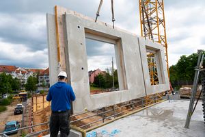  Fig. 2: Sandwich wall elements manufactured with Isolink C-Y during installation on the construction site  
