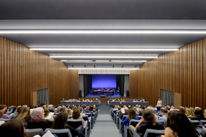 Fig. 5: Acoustically effective wall paneling made of warm wood ensures balanced sound distribution in the auditoriums 
