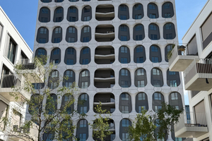  Fig. 1: The 18-story residential tower at Mahatma-Gandhi-Platz features a facade with glass-fiber-reinforced concrete elements  