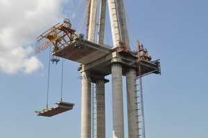  A crane carried the base plates directly from the raft to the final position 
 