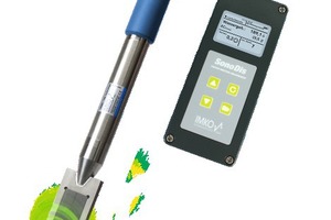  The image shows a ­Sono-WZ sensor with Sono-DIS handheld measuring unit: the radar wave that runs along the sensor at nearly at the speed of light is shown in green 
