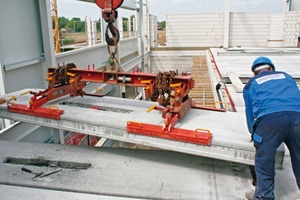  Fig. 1 Installing the climate-controlling prestressed concrete ceiling.  