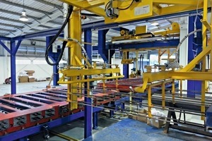  A reinforcement inserting manipulator installs the prepared prestressing wires in the concrete mould 