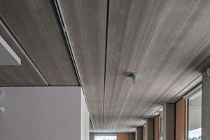  The two-story section is covered with 15.5 m long prestressed-­concrete hollow-core slabs 