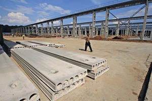  Finished products placed on the edge of the huge outdoor ­storage area  