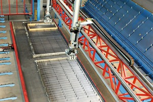  The entire reinforcement prefabrication unit was installed on a second level. This picture shows a portion of the Wire Center with its MSR straightening and cutting machine 