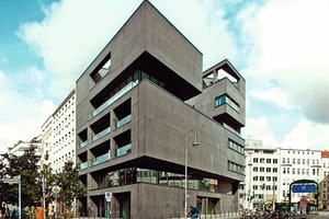  Fig. 2 The six-story building with the black façade made of Liapor lightweight concrete appears as if cut out of a single block. 