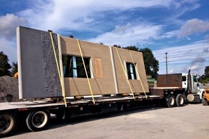  A finished element for the Naval Station Mayport Building Project is being transported to the job site 