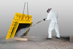  Fig. 2 Cleaning of mold base in protective equipment. 