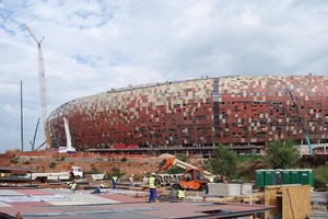  Fig. 4 Due to the natural colors of fibreC the Soccer City shines like an African Pot.  