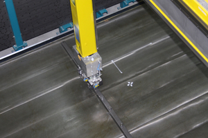  The multifunctional shuttering robot places the mold elements on the pallet. In the next step, the magnets are activated, and the mold elements are firmly fixed to the pallet  