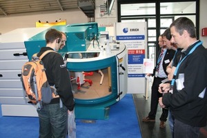  Fig. 7 Eirich demonstrated the benefits and inner workings of its mixing equipment to interested participants. 