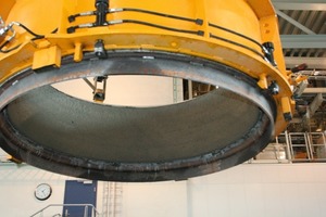  Fig. 3 The base ring well compacted is lifted to the curing area. 