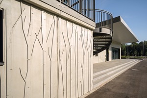  The architectural concrete surfaces of the Auwald Sports Center Gundremmingen mirror the surrounding riparian woodlands 