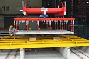  Lifting systems place the floor plates horizontally in stacks ready for transport 