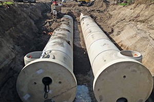  <div class="bildtext_en">Together with the throttle chamber, the two-pipe system with a length of 63 m twice and a diameter of 1.80 m builds the sewer with storage capacity and overflow in the new industrial area called “In der Langfuhr” in Bendorf</div> 