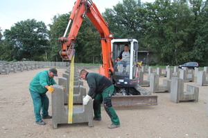  The solar modules are placed in position by excavator  