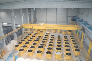  Fig. 1 The curing area and mold pool of the factory is suitable for the production of more than 100 manhole base section per shift.  