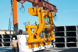  Fig. 1 As in the USA heavy loads are often handled and space is not an issue; A vacuum lifting and 90 degree turning device with a capacity of 24 ton manipulating a prestressed spandrel panel. 