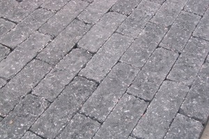  Fig. 2 Pavers randomly aged with Rota Cage. 