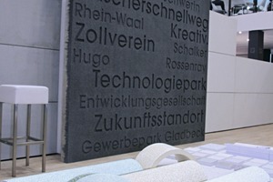  Hering presented various examples of elaborate façade design, ranging from Blingcrete (in the foreground) to a black colored panel with lettering relief (in the background)  