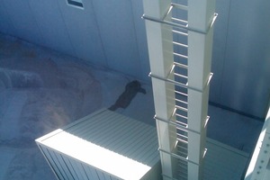  Fig. 7 The bucket conveyor feeds material into the silo tower. 