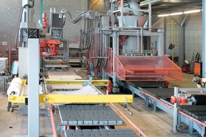  Fig. 2 After curing the pavers are stacked in layers and removed from the production boards (left side). 