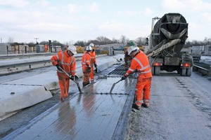  T beams are manufactured manually using ready mix trucks in the open air 