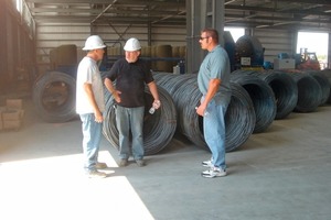  Fig. 2 Kevin Thompson (right) and Steve Bakonyi, Technical manager, talking to Arie van Ettekoven, Export Manager of Schlosser-Pfeiffer. 