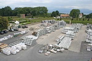  View to a part of the storage yard and the show garden; the beautiful view to Lake Geneva in the background on the right 