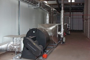  Fig. 7 Rear view of the oil fired air handling unit and insulated supply/recirculation ducting. 