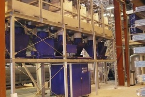  Fig. 8 The Universal System, set up for 6 colors and 2 mixers in a paving block production line in England. 