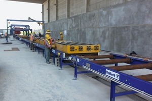  Roller conveyors transport the preassembled mold to a sound-insulated casting chamber  