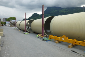  Pressurized pipes for the Rhone Oberwald power plant: a GRP pipe 51 mm thick, 6 m long, and 3 m in diameter was provided with an inner concrete shell 12 cm thick and was subsequently reinforced entirely with synthetic fibers 