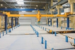  After concrete setting, the transfer table conveys the pallets to the second level, which is where a finish blade and four smoothing stations are available for concrete finishing 