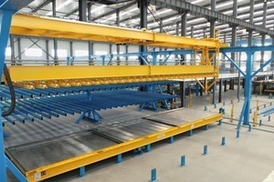  Magnetic crossbeam for inserting the reinforcement wire mesh produced into the ­prepared pallets 