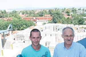  Fig. 11 Operator and one ­representative of the share-holders, Mr. Dudik (r.), present­ very glad their new ­paving block production. 