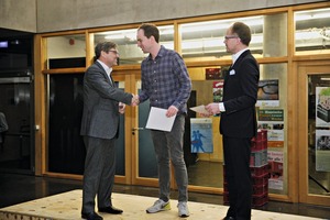  Prof. Dominik Wirtgen and Dipl.-Ing. Matthias Tillmann of FDB (right) honor Jochen Sauer (center)  