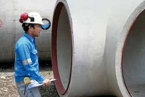  Bonna’s Quality Manager Masdipuro Simbolon during the ­final check of the concrete pipe before delivery 